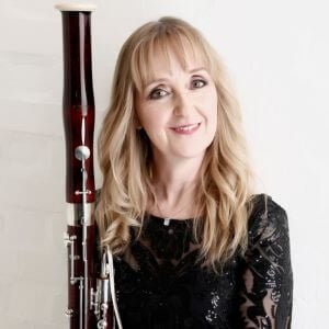 Portrait of Kim Murphy and bassoon