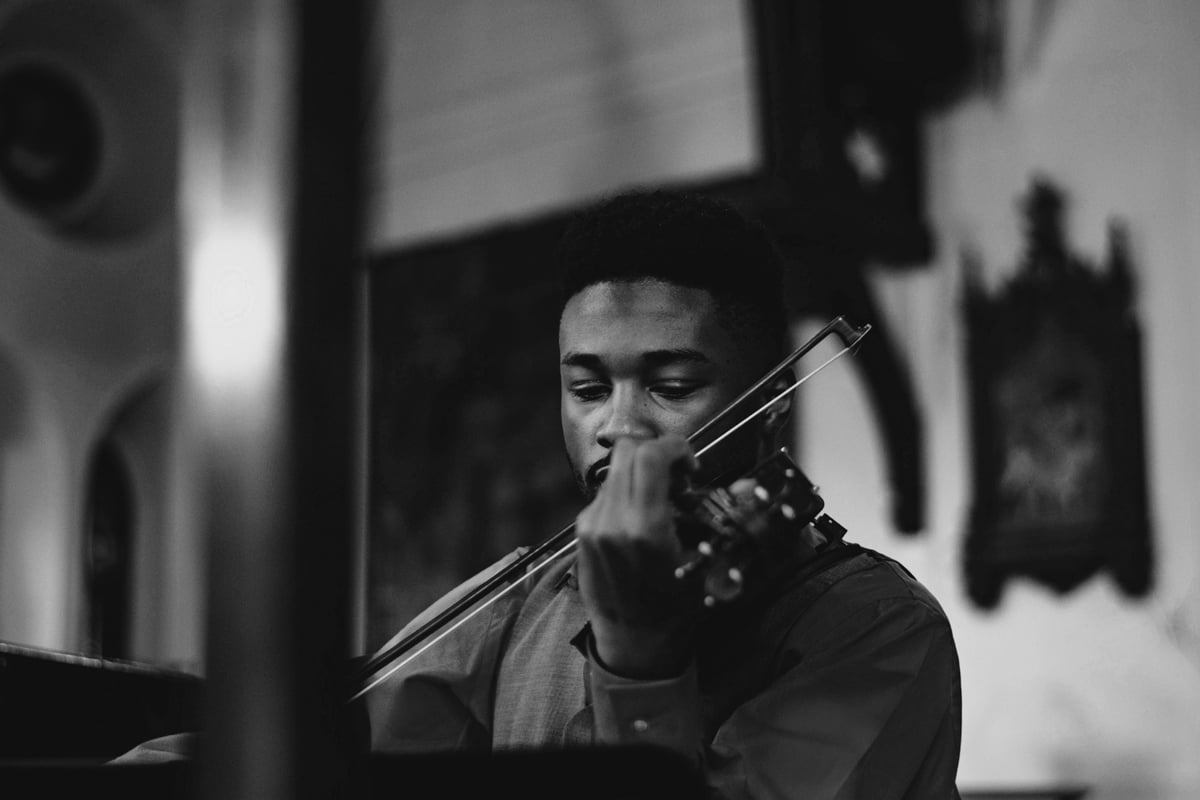 male violinist , black and white photo