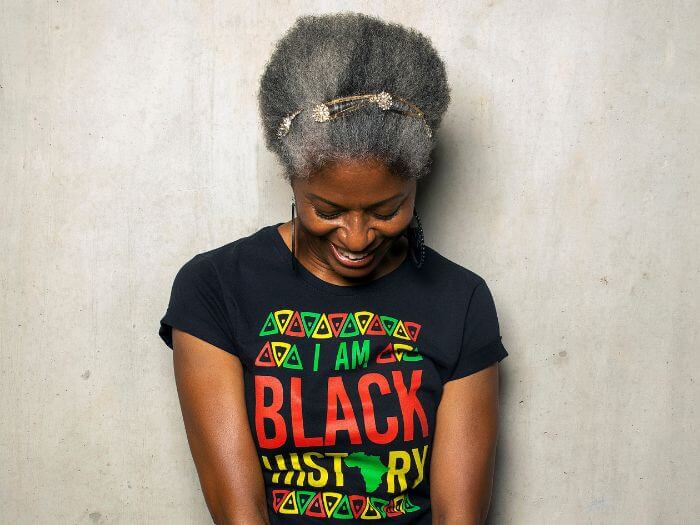 DJ Paulette wearing a T-shirt saying 'I am Black History'