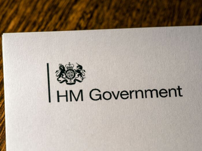 White official papers, blank, with text saying HM Government with the crest in top left corner.