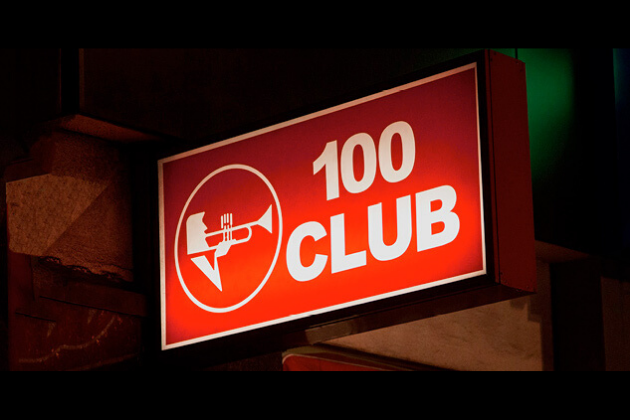 the 100 club street sign