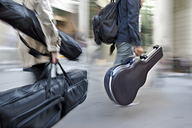 Musicians transporting music instruments while travelling